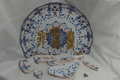 plat à décor de lambrequins, XXème siècle, avant restauration