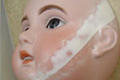 Tête de poupée, XXème siècle provenance inconnue, avant restauration